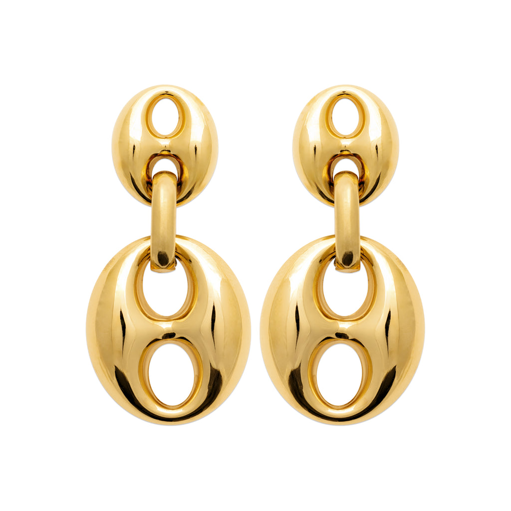 A pair of gold drop earrings with a polished spherical stud and a larger oval drop featuring concentric cutout rings, shown on a plain white background.