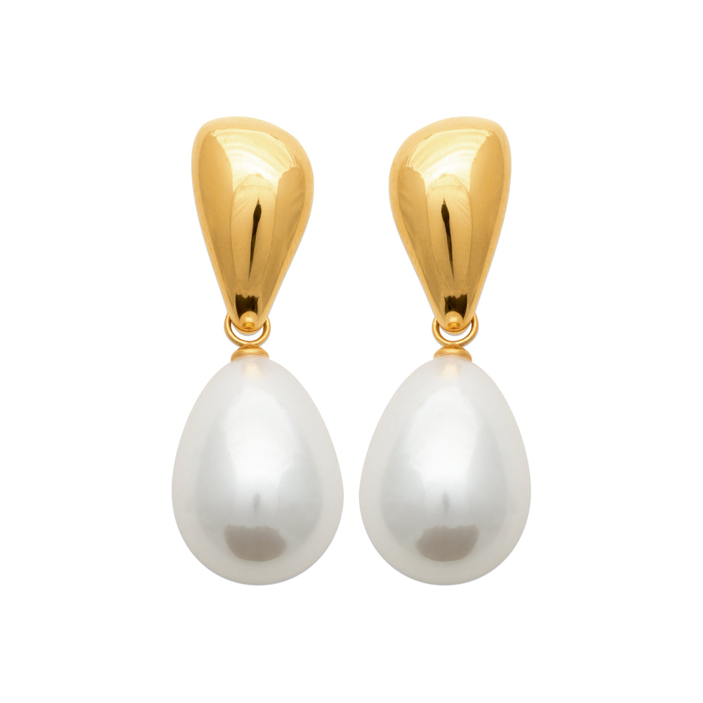 Gold earrings with white pearl drops on a white background