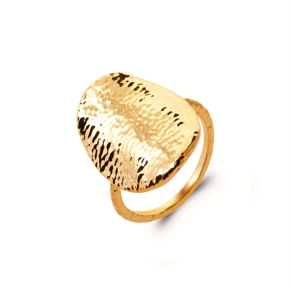 18K gold-plated hammered ring with a textured sculptural surface and contemporary statement design by HNKO