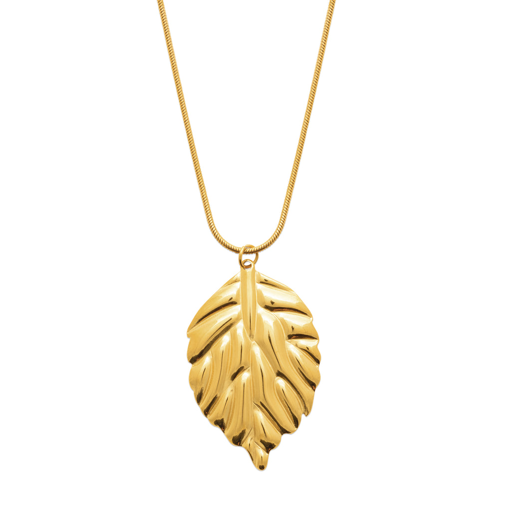 Gold-tone leaf pendant necklace with an organic botanical design inspired by Nordic nature by HNKO